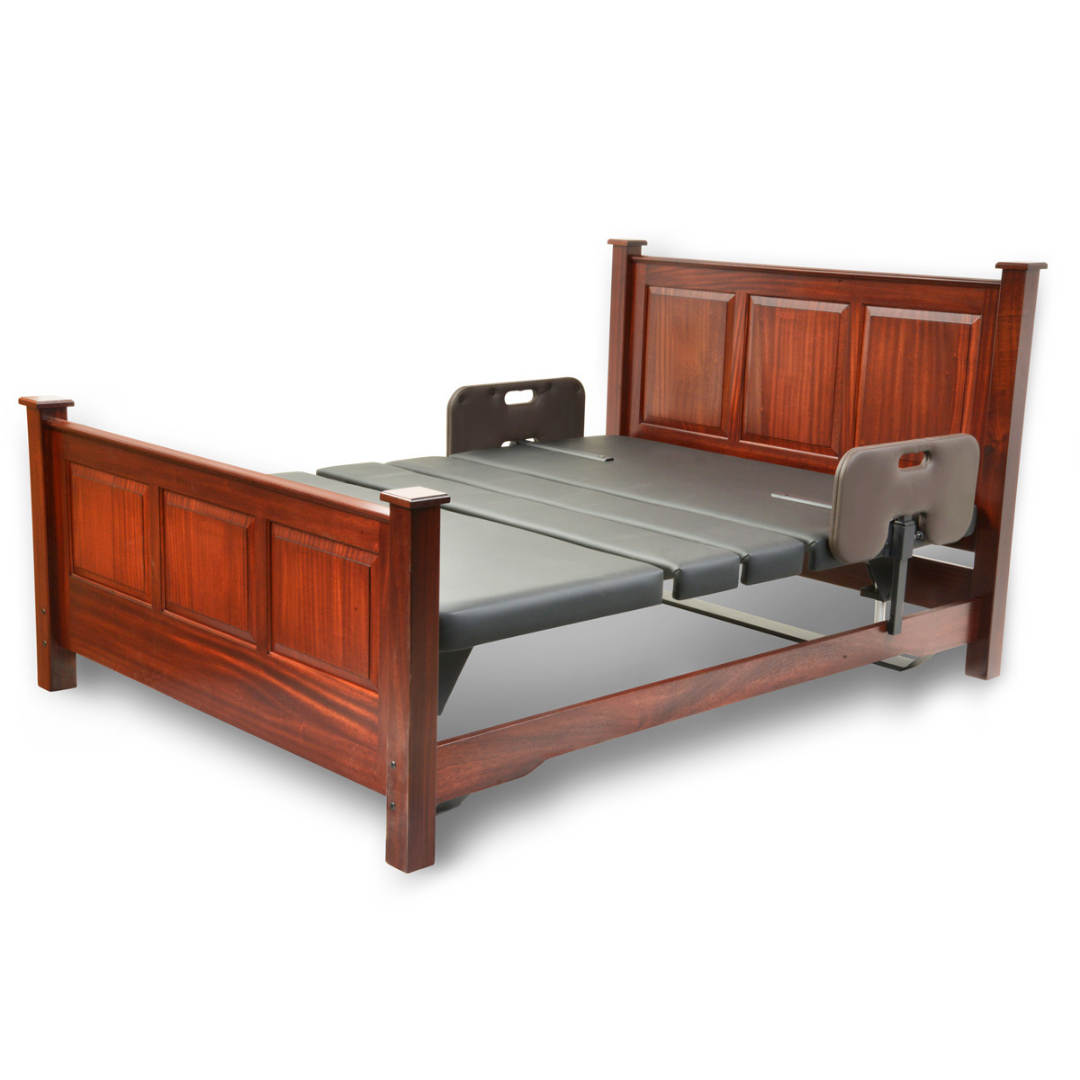 The Assured Comfort® Signature Series Hi-Low Adjustable Bed is a wooden split-king frame with paneled headboard and footboard, a gray adjustable mattress, and safety rails on both sides.